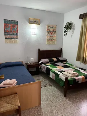 Cama o camas de una habitación en Villa Herrero