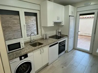 Una cocina o zona de cocina en Alameda Amable