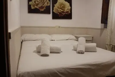 Cama o camas de una habitación en Aires de gredos/bajo