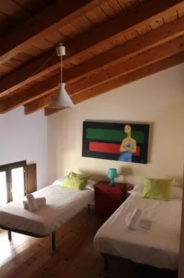 Cama o camas de una habitación en Ático aires de gredos