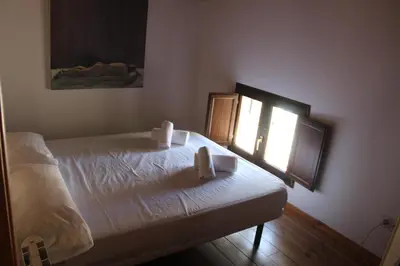 Cama o camas de una habitación en Ático aires de gredos