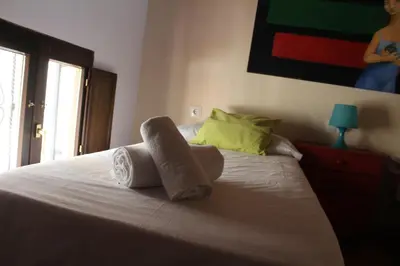 Cama o camas de una habitación en Ático aires de gredos