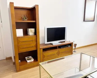 Una televisión o centro de entretenimiento en Arte y Vías Salamanca - PARKING GRATIS