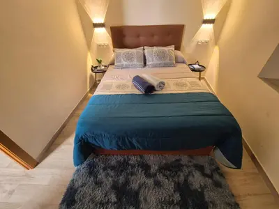 Cama o camas de una habitación en La Casita del Arco de San Andrés