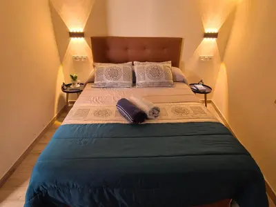 Cama o camas de una habitación en La Casita del Arco de San Andrés