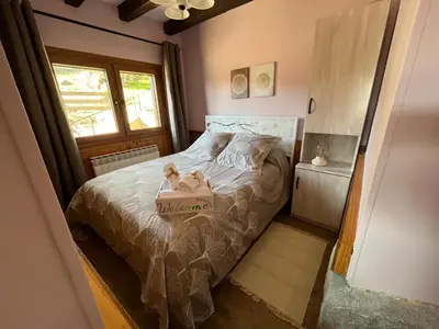 Cama o camas de una habitación en El Secreto del Arroyo