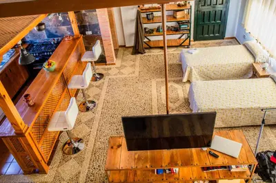Una televisión o centro de entretenimiento en Apartamento Loft La Encina