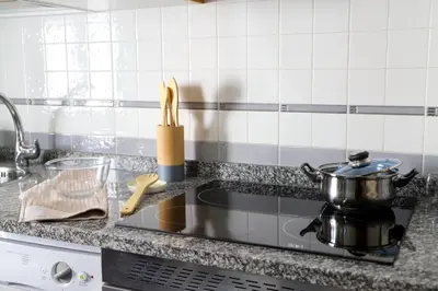 Una cocina o zona de cocina en Apartamento Turístico El Canalizo I