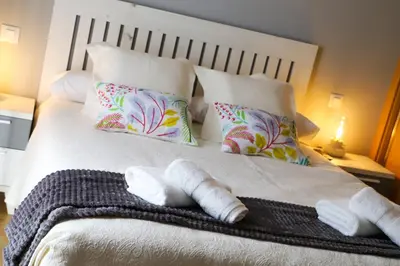 Cama o camas de una habitación en Apartamento Turístico El Canalizo I
