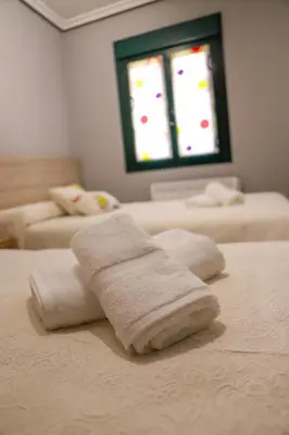 Cama o camas de una habitación en Apartamento Turístico El Canalizo I