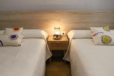 Cama o camas de una habitación en Apartamento Turístico El Canalizo I