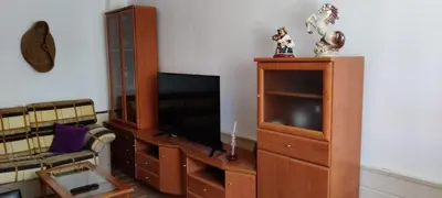 Una televisión o centro de entretenimiento en Casa El Rostro