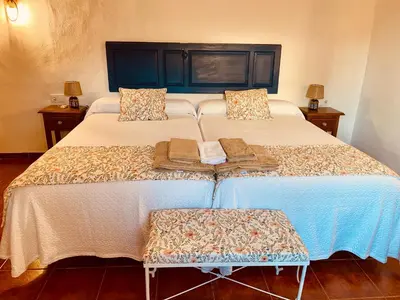 Cama o camas de una habitación en Complejo Rural Los Molinos