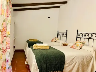 Cama o camas de una habitación en Complejo Rural Los Molinos