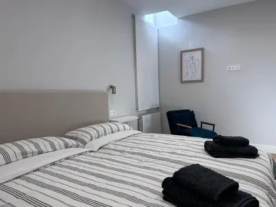 Cama o camas de una habitación en Apartamento Placentinos Centro Histórico