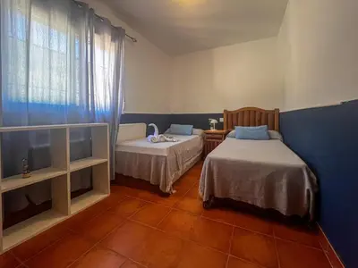 Cama o camas de una habitación en Casa en sierra de gredos piscina privada