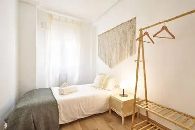 Cama o camas de una habitación en Apartamento Torre de la Clerecía centro