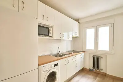 Una cocina o zona de cocina en Apartamento Torre de la Clerecía centro