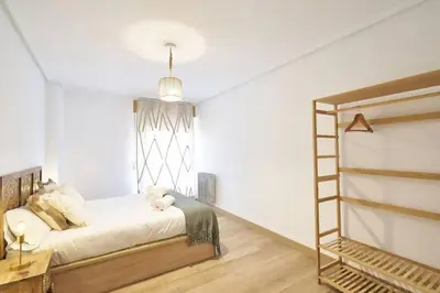 Cama o camas de una habitación en Apartamento Torre de la Clerecía centro