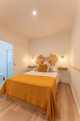 Cama o camas de una habitación en Apartamento Turístico KHöALA HOME