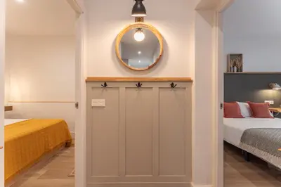 Cama o camas de una habitación en Apartamento Turístico KHöALA HOME