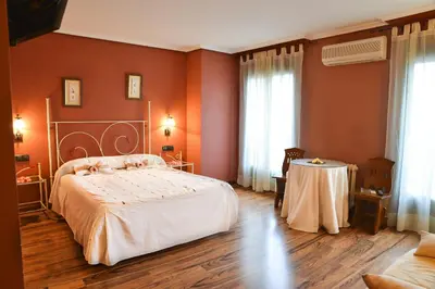 Cama o camas de una habitación en Café Bar Hotel Jefi