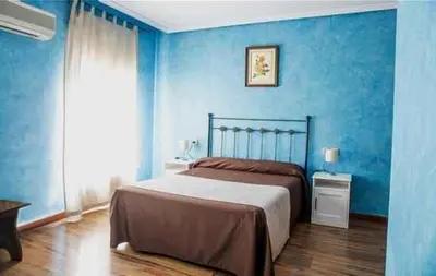 Cama o camas de una habitación en Café Bar Hotel Jefi