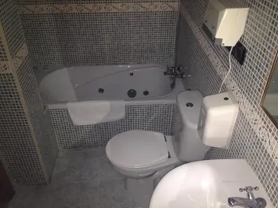 Un baño de Café Bar Hotel Jefi