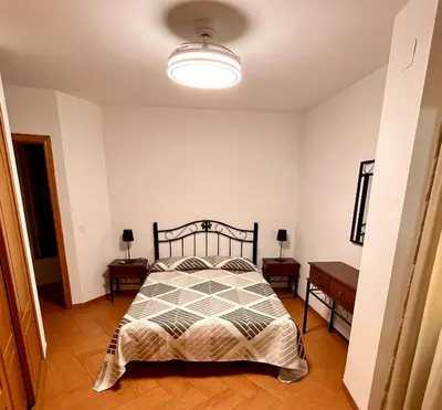 Cama o camas de una habitación en APARTAMENTOS TURíSTICOS MONTASOL 1