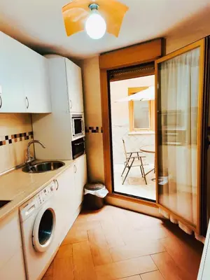 Una cocina o zona de cocina en APARTAMENTOS TURíSTICOS MONTASOL 1