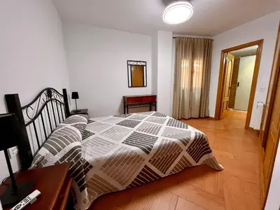 Cama o camas de una habitación en APARTAMENTOS TURíSTICOS MONTASOL 1