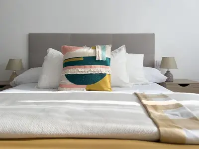 Cama o camas de una habitación en Apartamentos Gredos 101