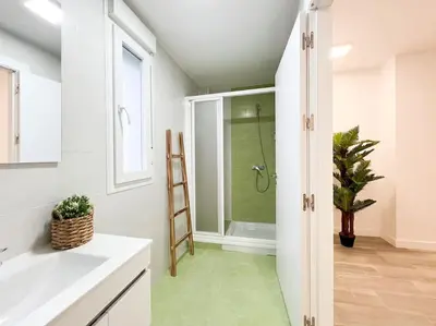 Un baño de Apartamentos Gredos 101