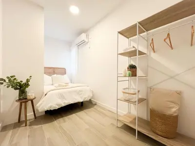 Cama o camas de una habitación en Apartamentos Gredos 102