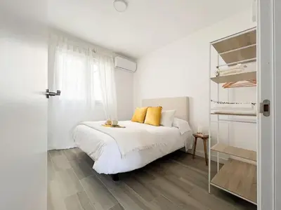 Cama o camas de una habitación en Apartamentos Gredos 103