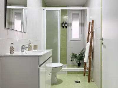 Un baño de Apartamentos Gredos 103