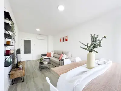 Una televisión o centro de entretenimiento en Apartamentos Gredos 103