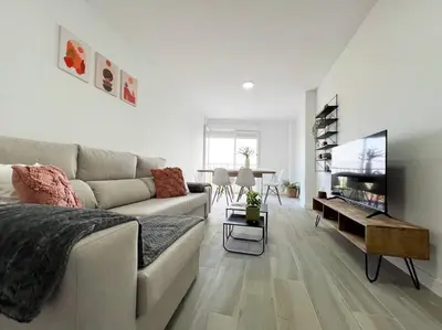 Una televisión o centro de entretenimiento en Apartamentos Gredos 104
