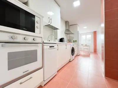 Una cocina o zona de cocina en Apartamentos Gredos 304