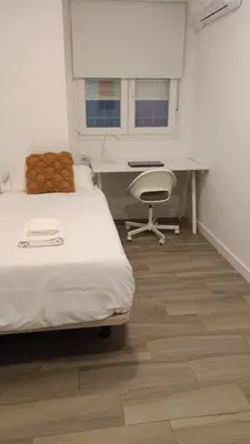 Cama o camas de una habitación en Apartamentos Gredos 301