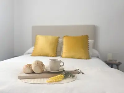 Cama o camas de una habitación en Apartamentos Gredos 204