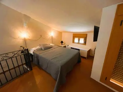 Cama o camas de una habitación en APARTAMENTOS TURíSTICOS MONTASOL 2