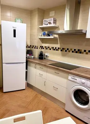 Una cocina o zona de cocina en APARTAMENTOS TURíSTICOS MONTASOL 2