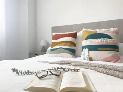 Cama o camas de una habitación en Apartamentos Gredos 203
