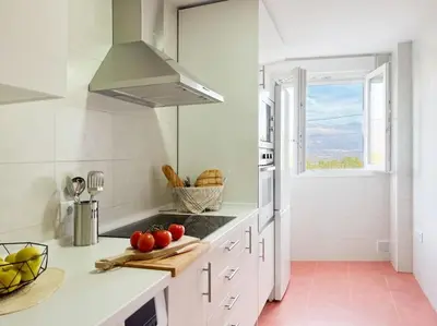 Una cocina o zona de cocina en Apartamentos Gredos 203