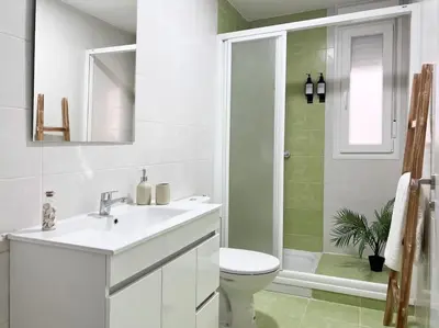 Un baño de Apartamentos Gredos 203