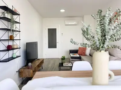 Cama o camas de una habitación en Apartamentos Gredos 203