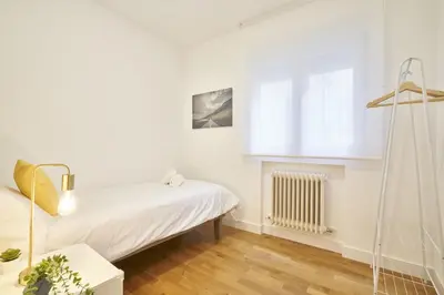 Cama o camas de una habitación en Alojamiento Abajo10 Centro