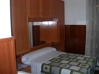 Cama o camas de una habitación en Pension Estefania