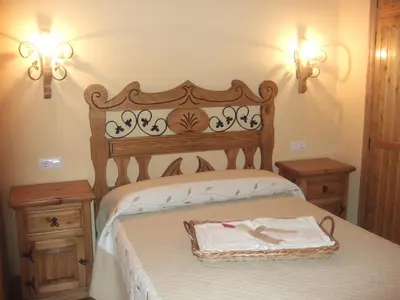 Cama o camas de una habitación en Tinao de Gredos